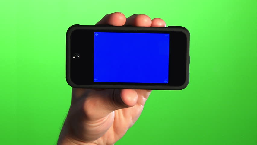 Holding a portable media player.  Green screen for your custom background, and a blue screen for your custom video content.  Blue screen has corner has marks for advanced tracking.  