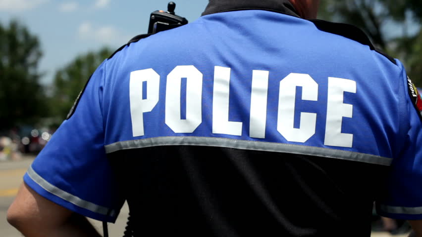 Back of Police officer on Street