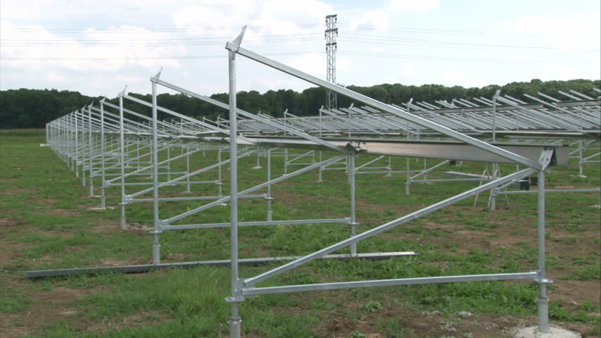 Assembling construction of solar power plant. Time lapse, fast motion. 