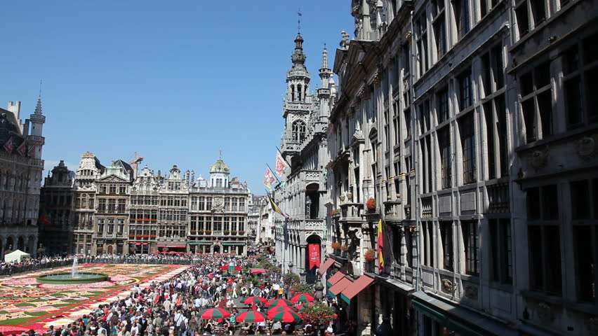 BRUSSELS - AUGUST 14TH, 2010. Every two years thousands of visitors come to see the floral carpet on the famous Grand Place square. Almost 800,000 begonias were used this year, on August 14, 2010 in Brussels. 