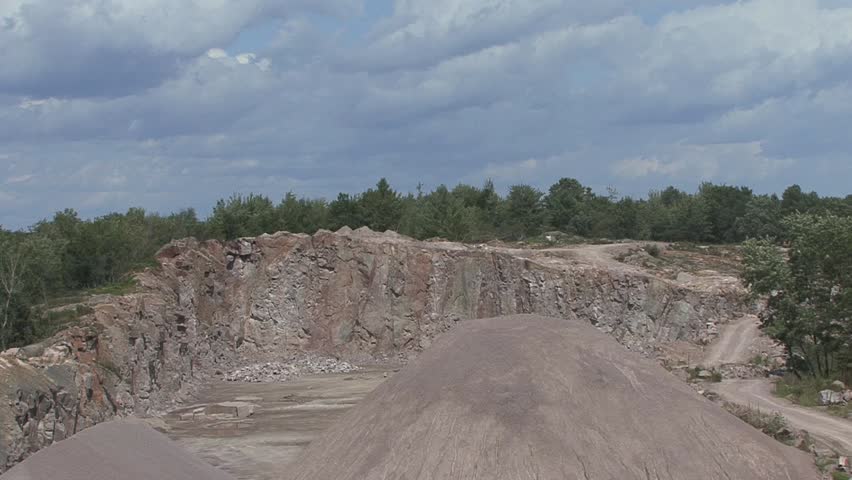 Miners set the explosion at the open pit quarry.