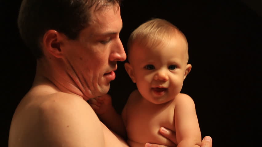 Daddy and Baby against Black Background Series 2
