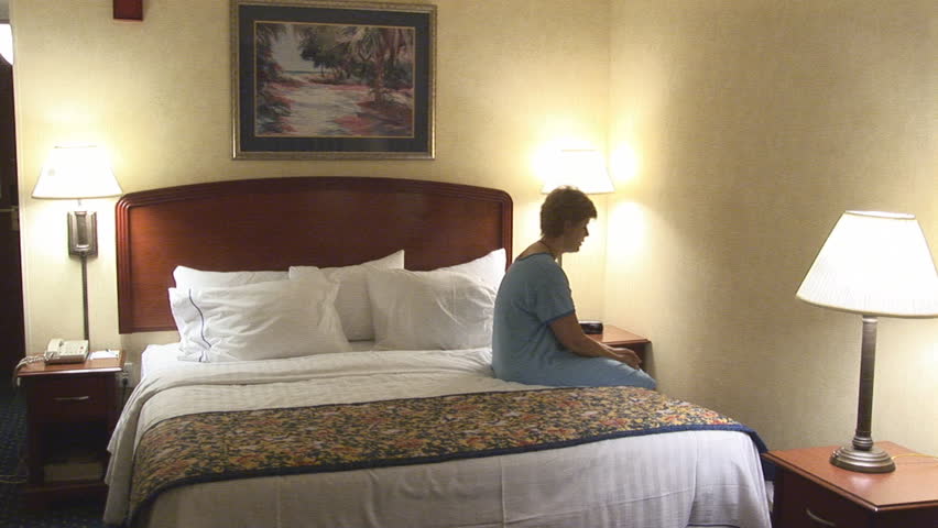 Woman in hotelroom dead tired