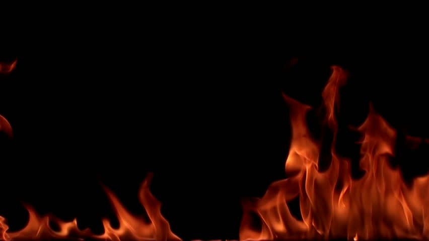 Fire flame isolated on black background. slow motion