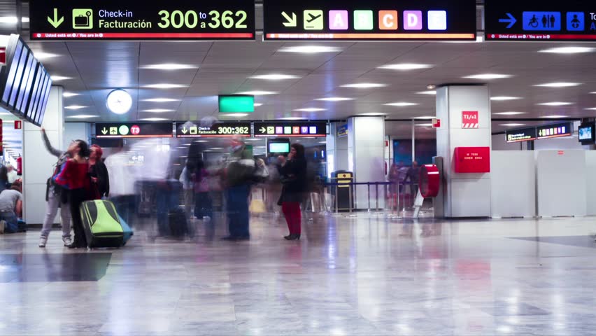 People hurrying in the Barajas T1 airport. Time Lapse 