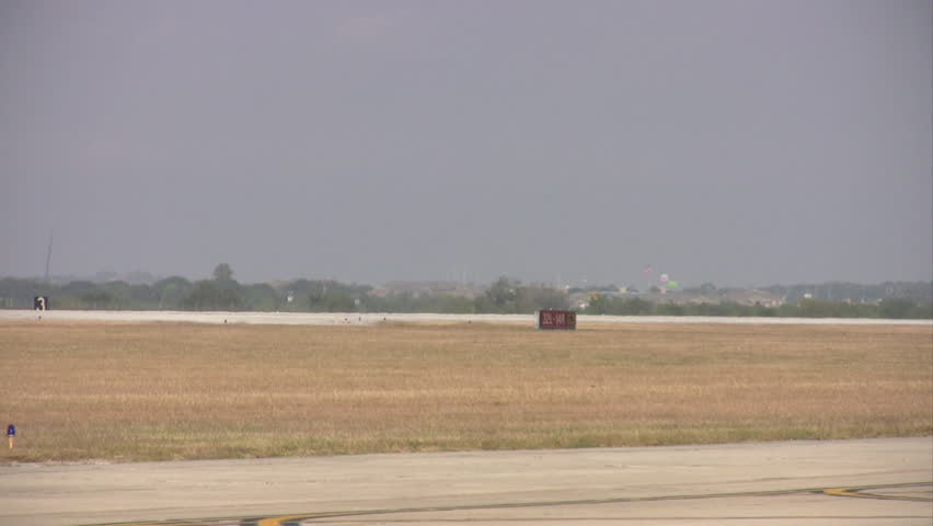Video of C-17 Globemaster III aircraft landing at Randolph AFB Texas. Backing up with reverse thrust. Air Force cargo transport aircraft built by Boeing Aircraft. 