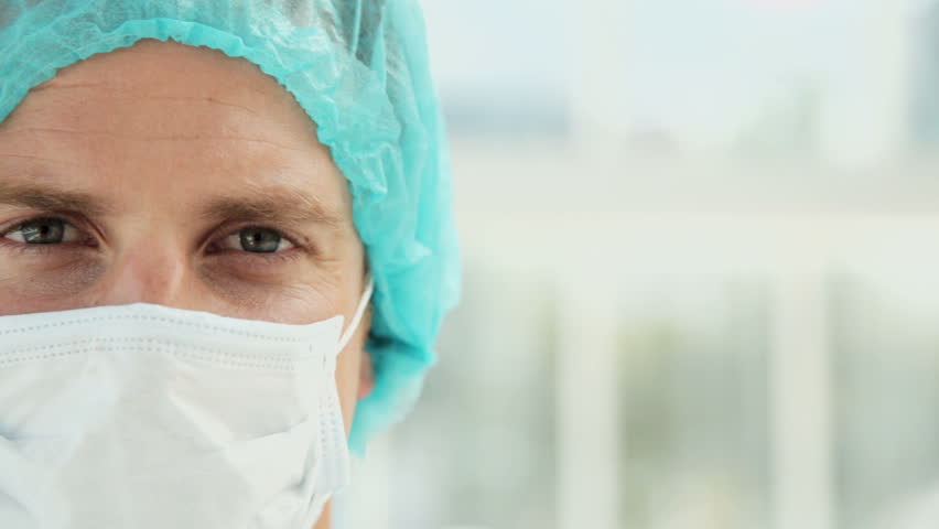 Closeup of a Male Surgeon in Scrubs