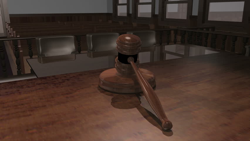 Animation of a gavel on the bench in an empty courtroom