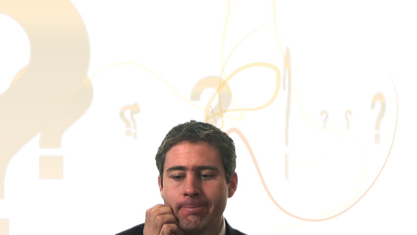 Businessman and question marks
