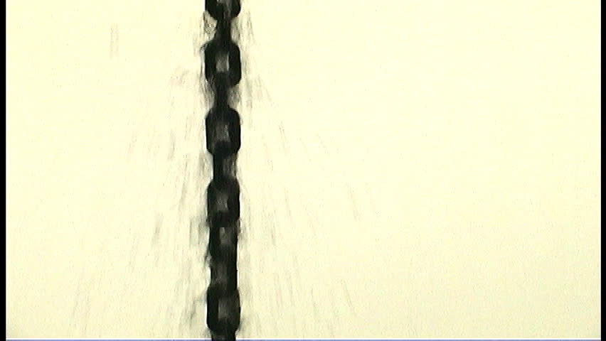 rainwater flowing down chainlinks