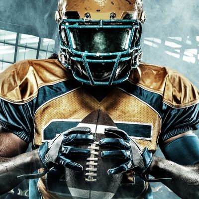 アクション中の競技場でのアメリカンフットボール選手 スポーツ用の壁紙とコピー用スペース の写真素材 今すぐ編集