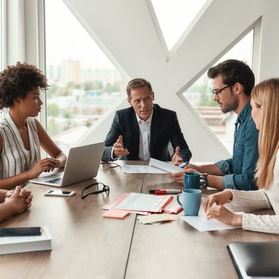 Coffee Break During Business Meeting Vertical Stock Photo (Edit Now