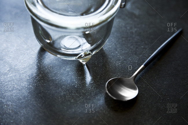 An empty jar with a spoon.