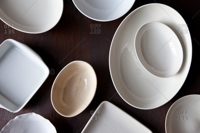 An overhead shot of a spread of empty serving dishes.