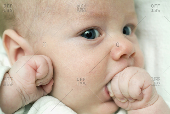 Baby store licking hands