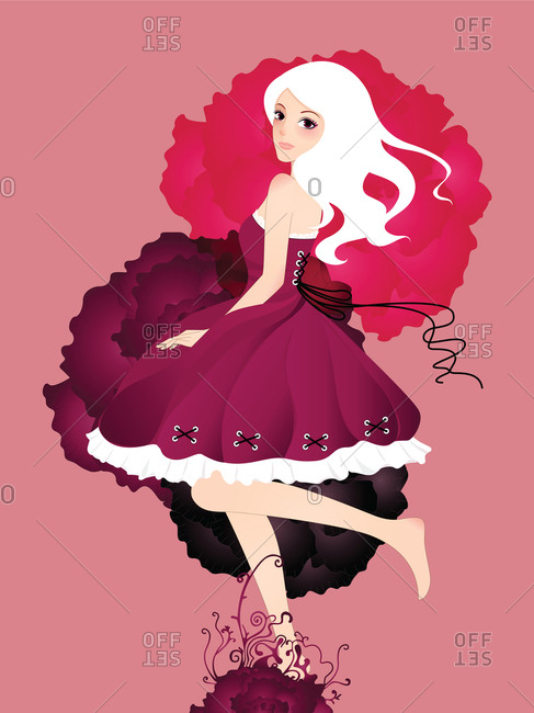 A young woman dancing in front of a flower motif