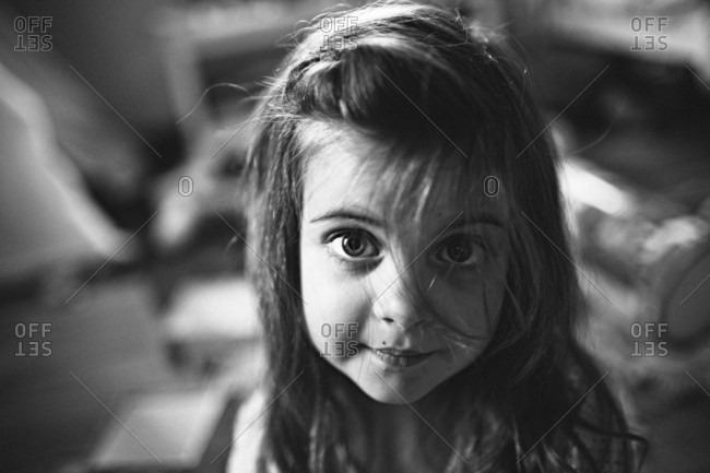 little girl looking up into camera