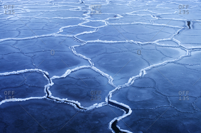 Patterns in the ice near the coast,  Sweden.