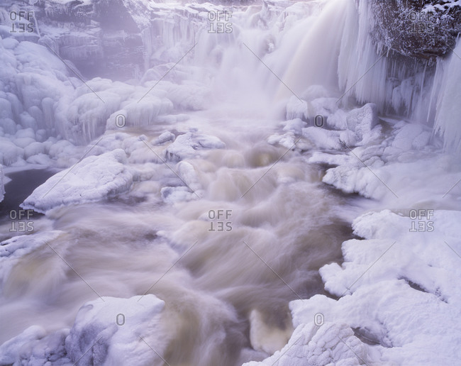 Ice and snow by a water fall,  Sweden.