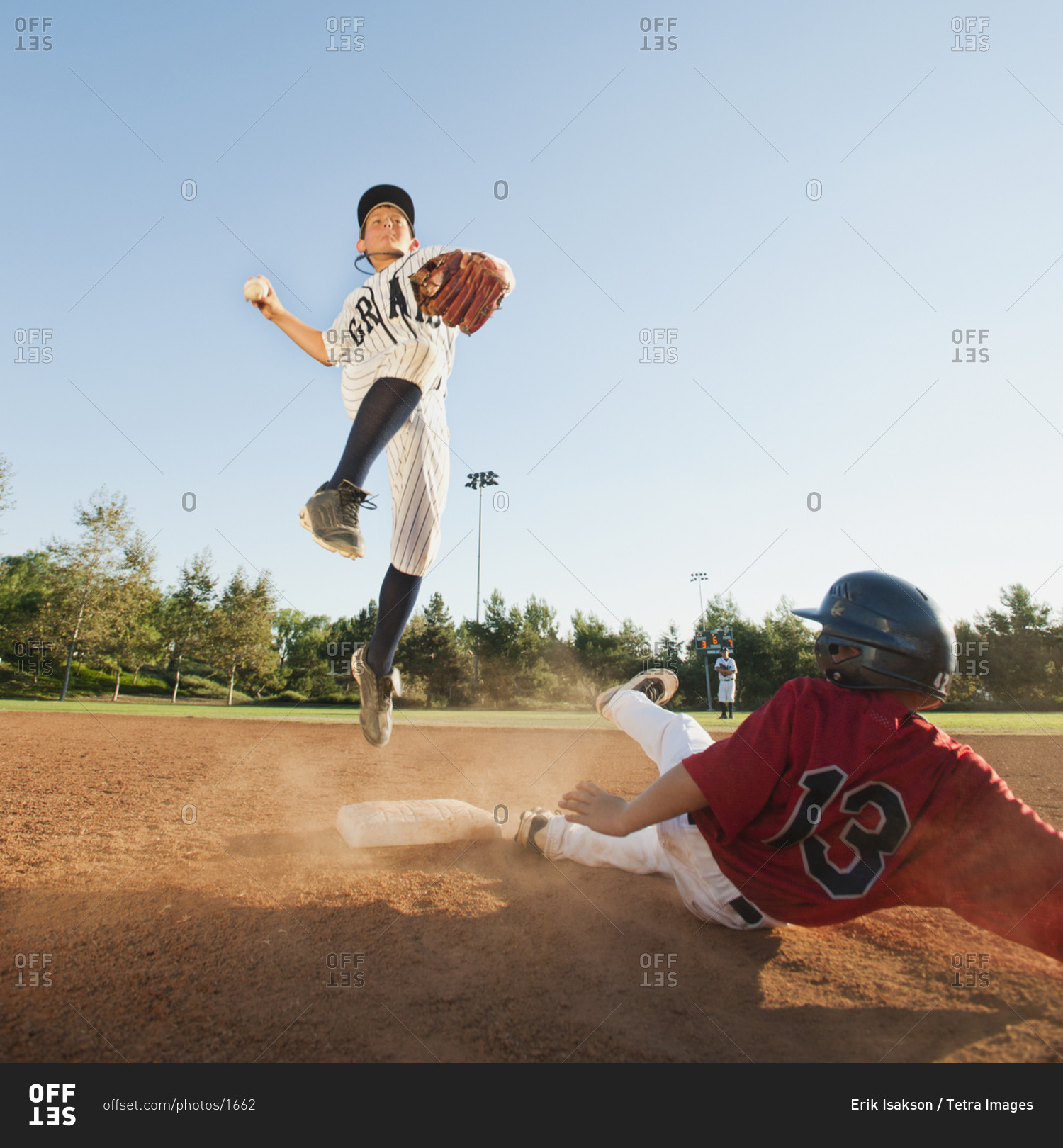 Boys (10-11) playing baseball