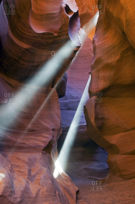 Beams of light penetrate Lower Antelope Canyon located outside of Page, AZ