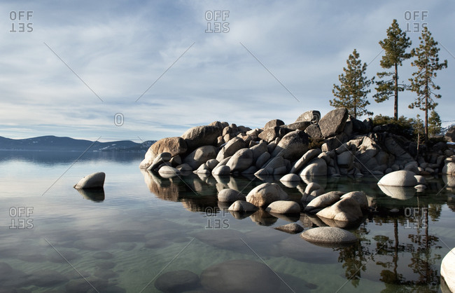 A calm and peaceful winter evening brings out the clarity of Lake Tahoe, Nevada