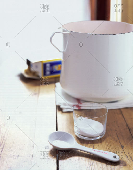 Empty pot on wooden table in the kitchen