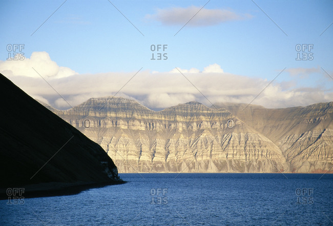 Mountains and fiord in sunset, Svalbard