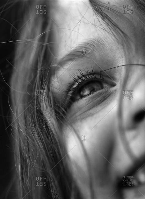 Girl smiling with hair falling on her face