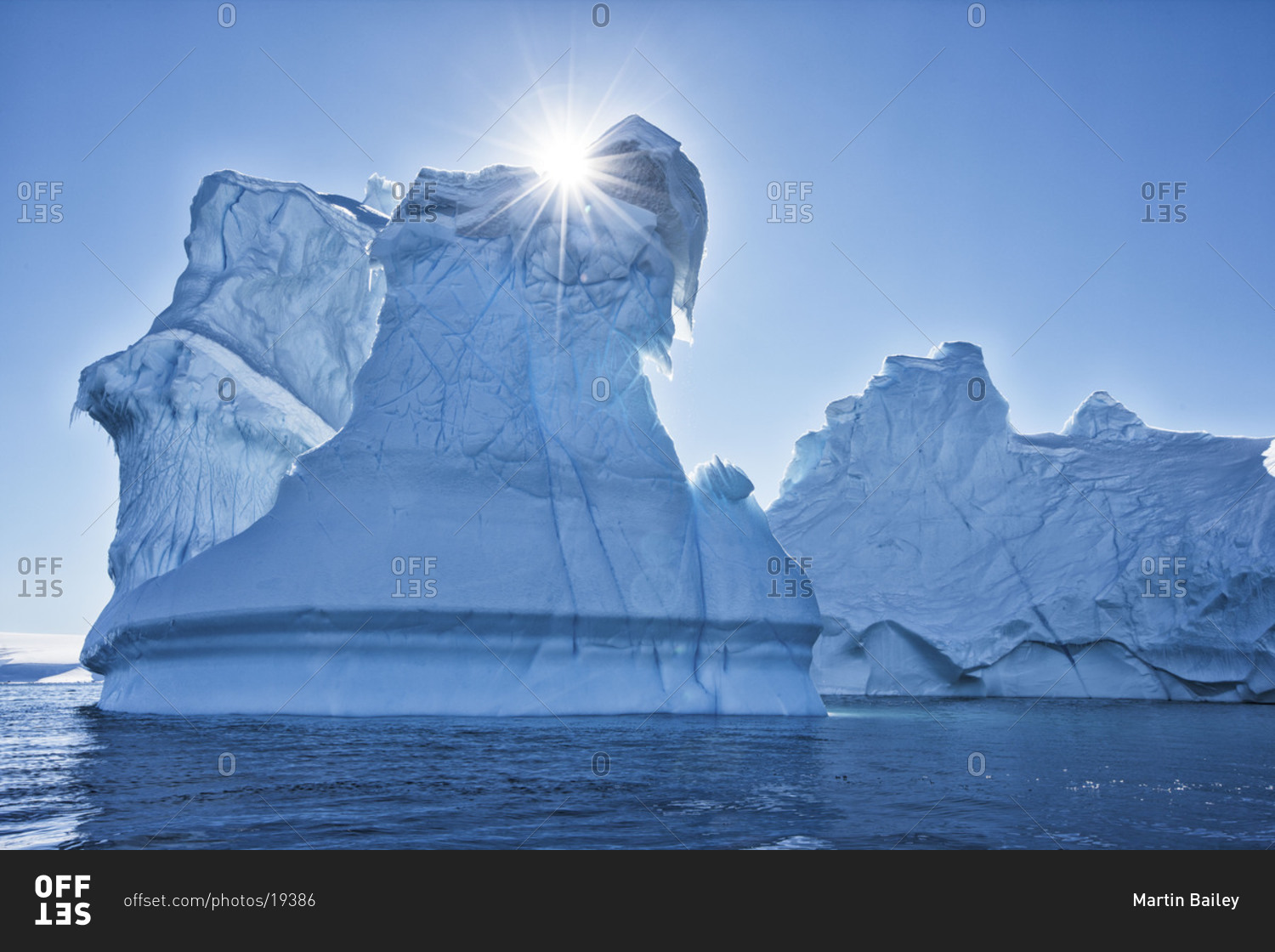 Large iceberg formations floating offshore of the ice sheet of Antarctica