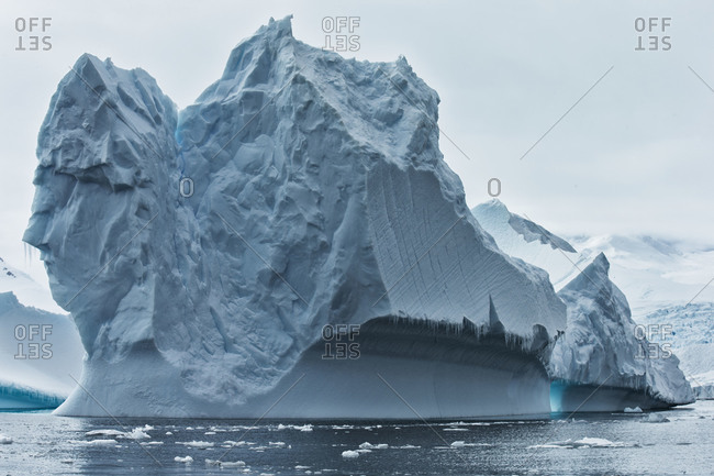 Massive iceberg formations floating offshore of the ice sheet of Antarctica