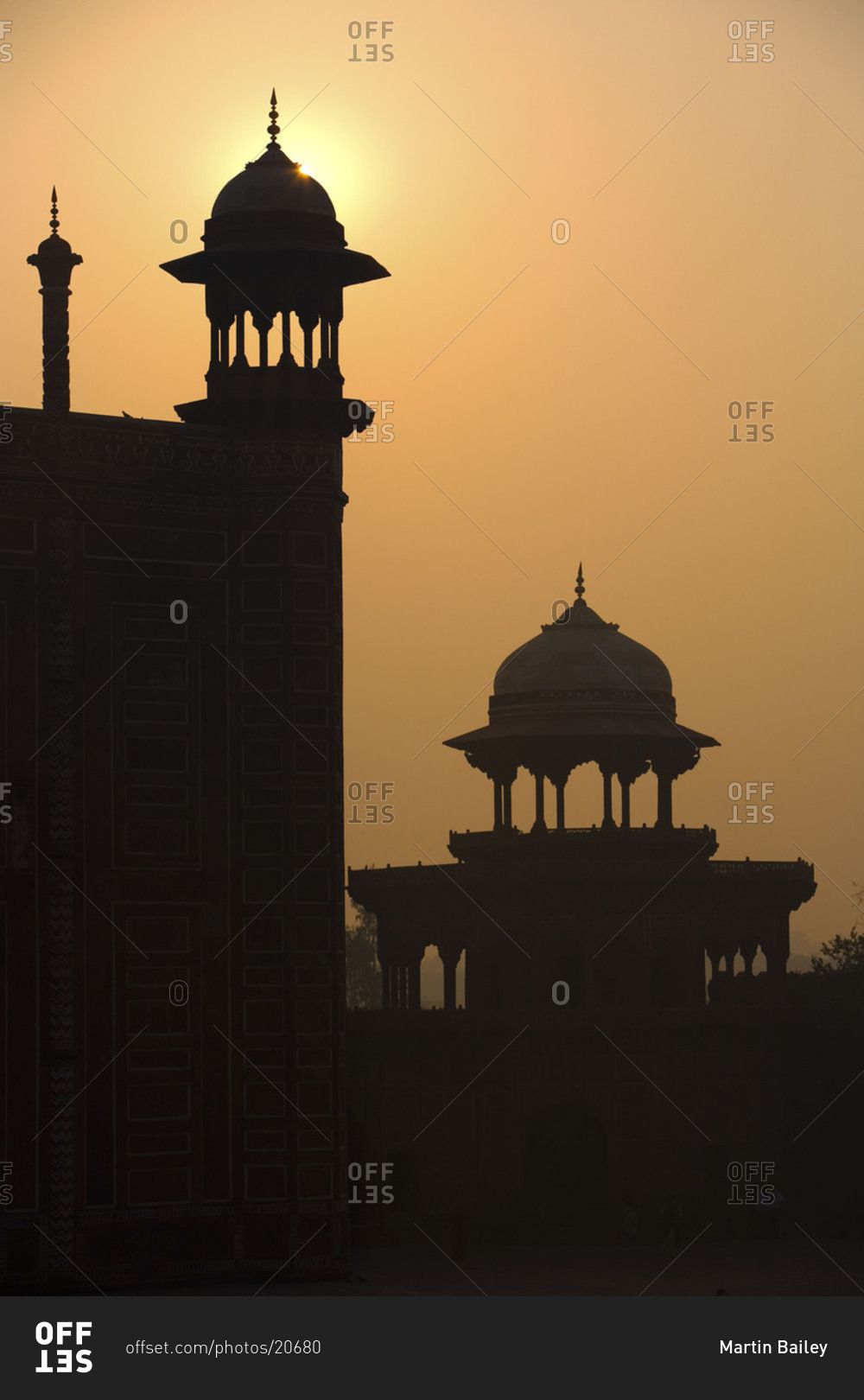 The sun peeks through the architecture at Agra, India