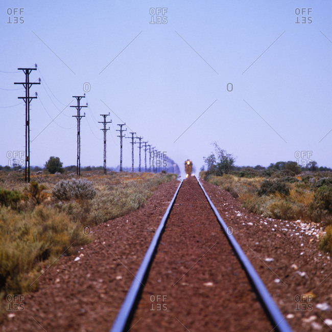 Railway Line with Train in Distance