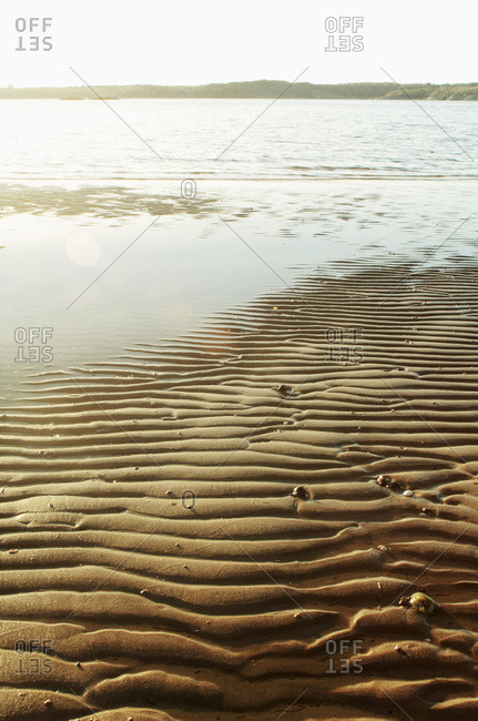 Wet sand pattern on beach