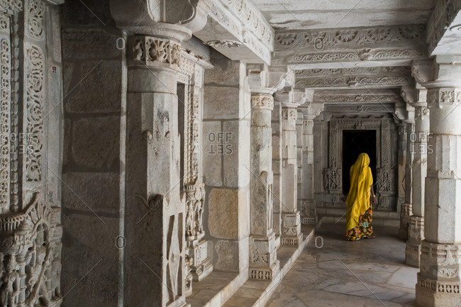A Hindu woman wearing traditional Sari vistis Ranakpur Jain temple