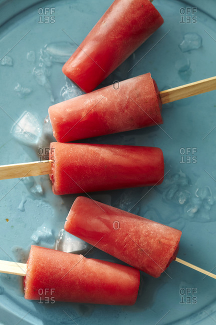 Homemade watermelon ice pop sticks overhead