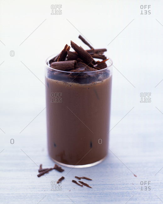 Chocolate milk topped with chocolate shavings