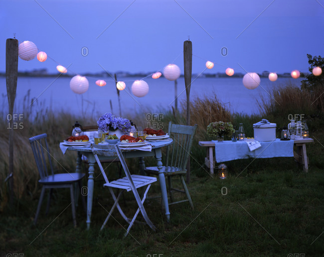 Table spread for party in dusk outdoors