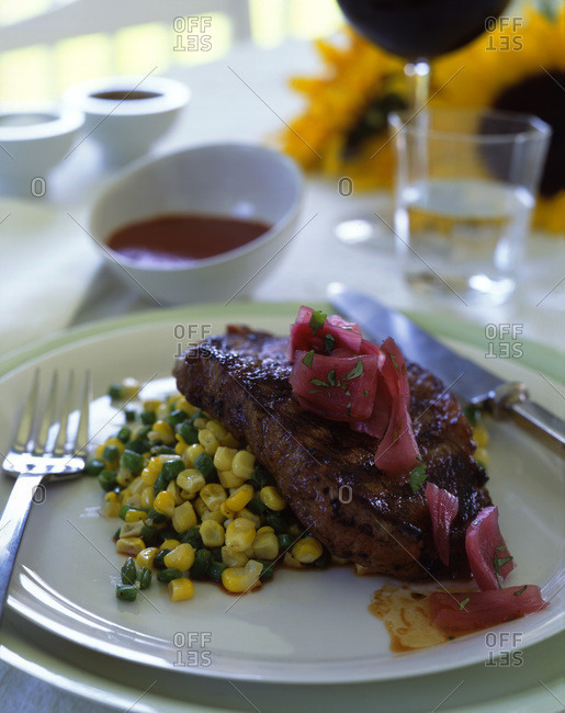 Tasteful beef steaks served with vegetables