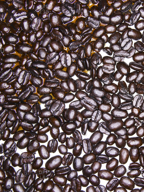 Coffee beans with partial coffee spill