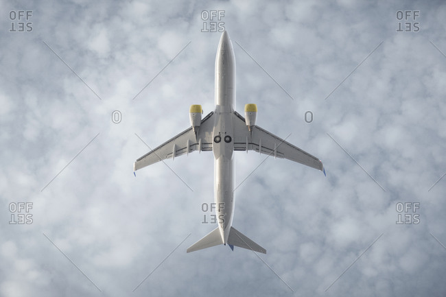 An airplane from directly below