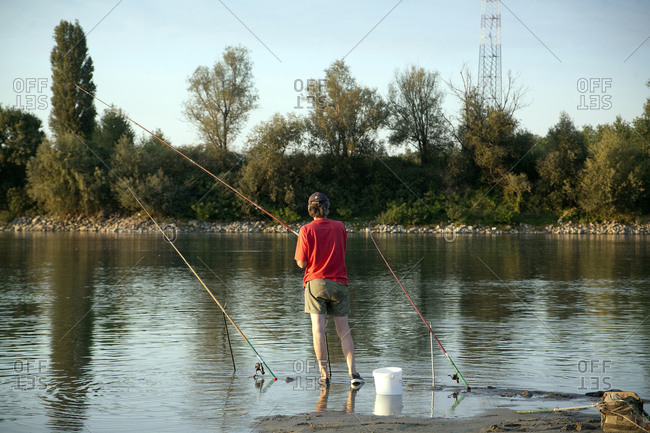 Man Fishing In River P___ Boretto, Italy