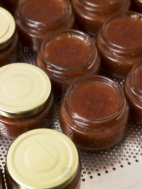 Close up of jars filled with rhubarb jam