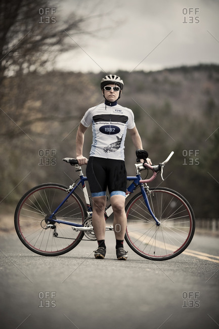 A biker ride motorcycle on the highway in the city view from above, warm  evening light Stock Photo - Alamy