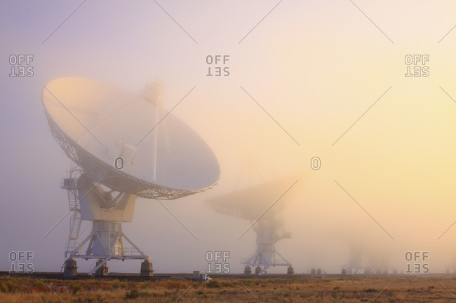 The National Radio Astronomy Observatory's 'Very Large Array' (VLA) in fog The Plains of San Agustin southwestern New Mexico