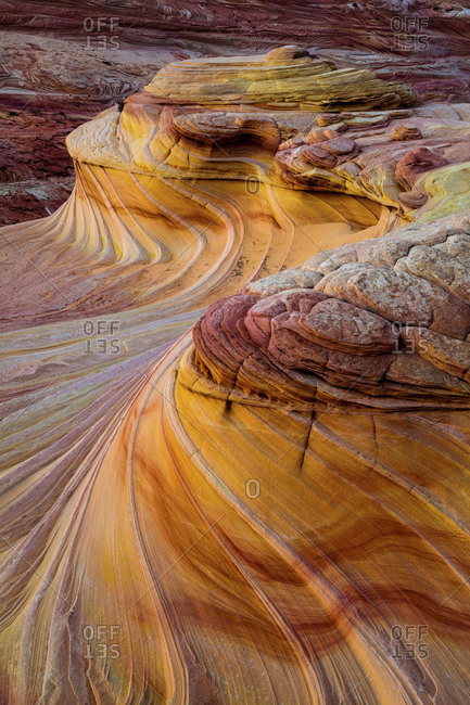 Twisted and sculpted sandstone at The Wave Coyote Buttes in the Vermilion Cliffs National Monument