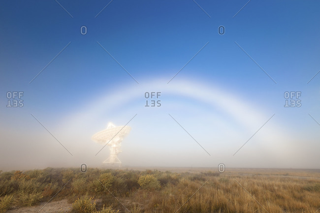 A fog bow over the National Radio Astronomy Observatory's 'Very Large Array' (VLA) The Plains of San Agustin southwestern New Mexico