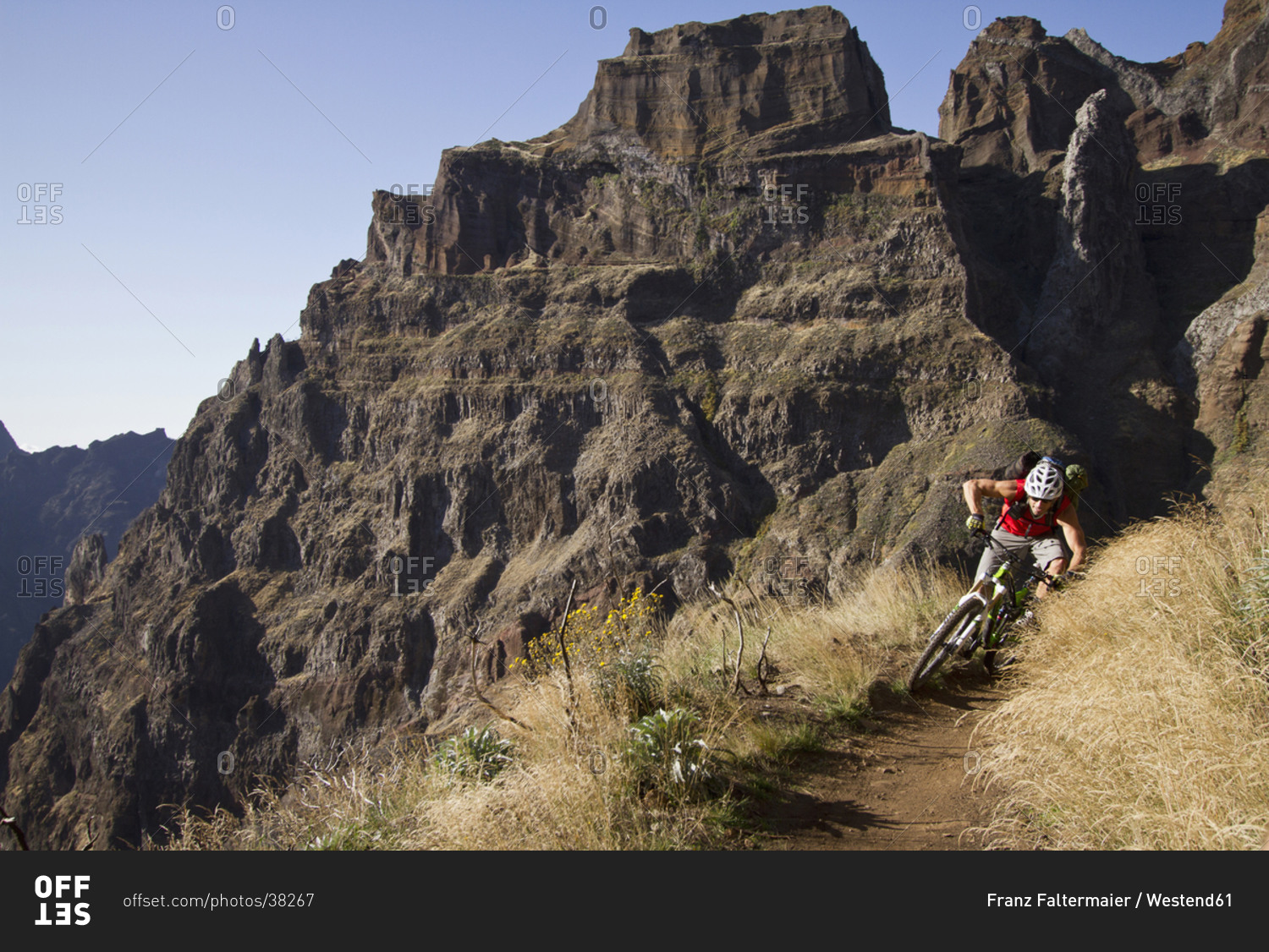 Portugal, Madeira, Mature man riding mountain bike
