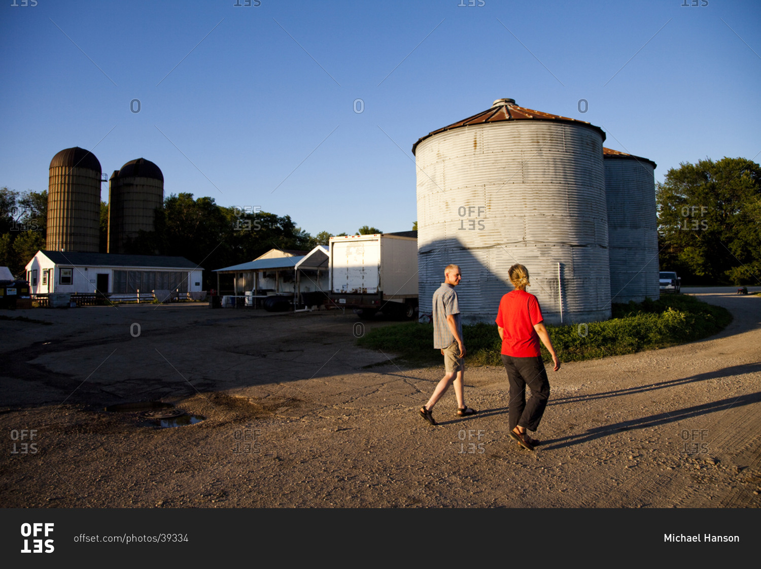 A woman and her husband on a urban farm  in Illinois