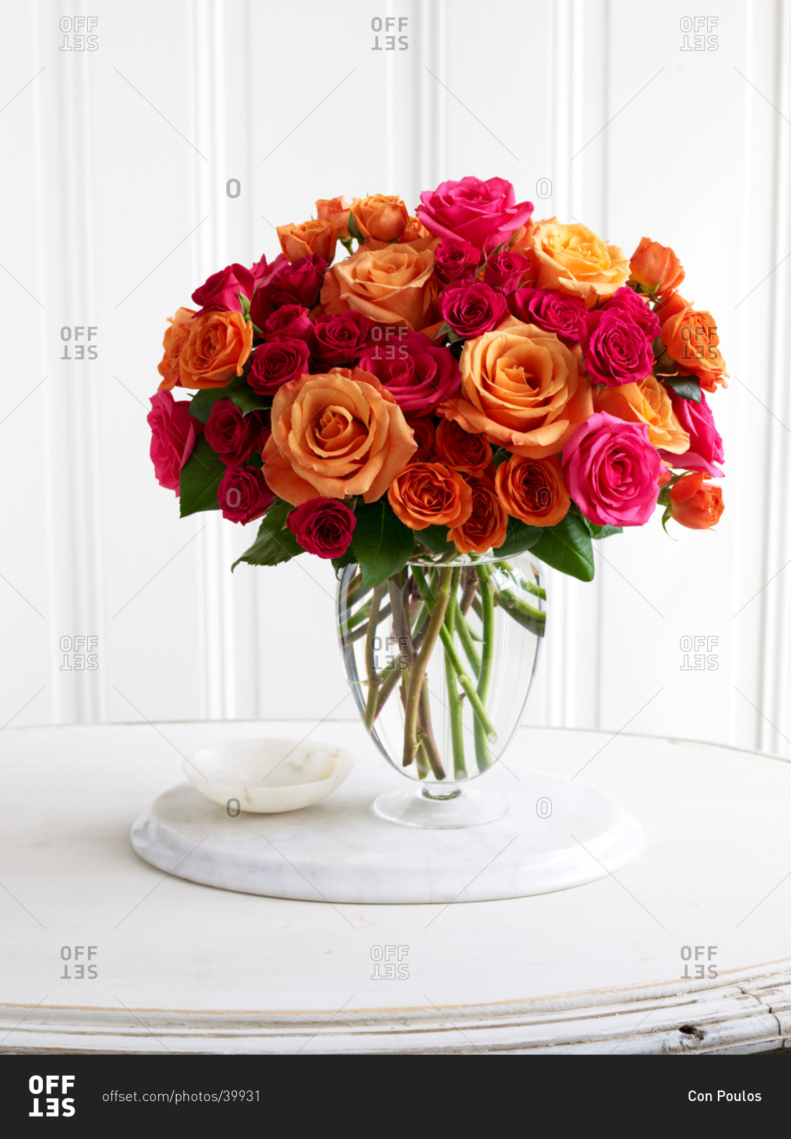 Colorful roses in glass vase